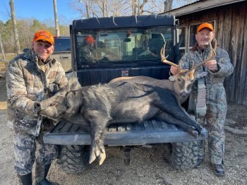 Ed Hinsaw and Mike Helms with pork and burger!