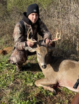 Garrett Hughes with a early buck